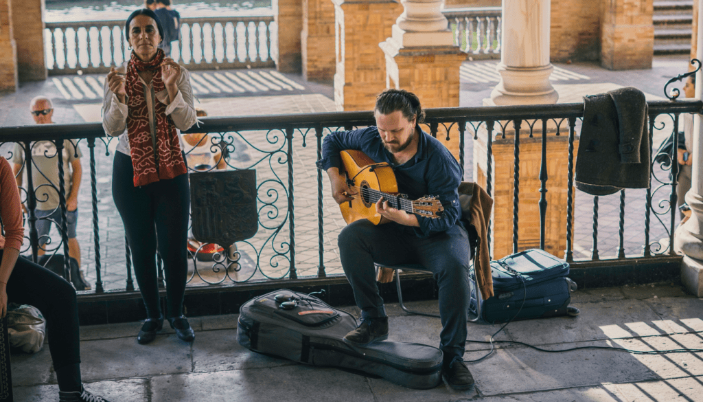 a man playing a guitar